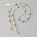 Detail of 120cm acrylic and pearl strap with amber beads and golden metal lobster clasps - Apricot (120cm)