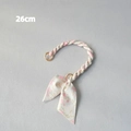 Close-up of a 26cm floral fabric woven handbag strap with golden rings and a matching bow - Pink Beige Floral (7) / 26cm Pieces/Pack