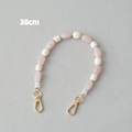 Detailweergave van 38cm acryl kralenketting met roze kralen en gouden karabijnsluitingen - Roze Ovale Kralen Splicing Wit (3)