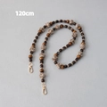 Detail of 120cm phone strap with wooden beads, tiger eye stones, and grey faux fur pompom - Style 1 / 120cm