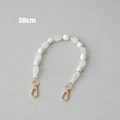 Détail de la chaîne de 38cm en perles acryliques mates avec fermoirs dorés raffinés - Cylindre Blanc Cassé avec Transparent