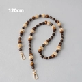 Detailed view of 120cm beaded chain with wooden beads, tiger eye stones, and plush balls - Style 3 / 120cm