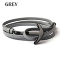 Close-up of grey leather wrap bracelet with black metal anchor clasp in nautical style - Gray