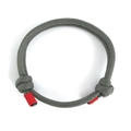 Minimalist grey 550 paracord bracelet with adjustable knots and red detail - Woven Style / Gray