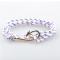 Detail of nautical braided rope bracelet with golden fish hook anchor clasp hardware - Red/White/Blue Interwoven With Gold Clasp (GF-04)