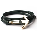 Close-up of dark green leather wrap bracelet with a polished golden anchor clasp - Green