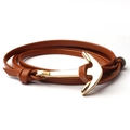 Close-up of brown leather double-wrap bracelet with a gold metal anchor shackle clasp - Khaki