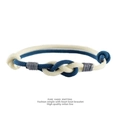 Macro shot of hand-woven Milan rope bracelet with a heart knot and adjustable cord - Cream White + Cyan