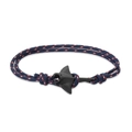 Macro detail of nautical braided cord bracelet with black matte manta ray metal charm - Blue Red White Camouflage Rope Black Manta Ray