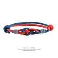 Handmade red and blue Milan cord bracelet featuring a minimalist heart-shaped knot design - Cyan + Red