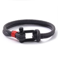 Detail of grey braided milanese rope bracelet with black U-shaped shackle and red accent - 19cm / Dark Gray Rope Black Buckle