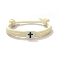 Close-up of adjustable cream braided cord bracelet with a white square cross bead - Off White