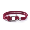 Detail of red woven double-cord bracelet featuring a silver U-shaped metal shackle clasp - Burgundy