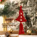 Detail of red macrame Christmas tree ornament with white wood beads and tassel - Red