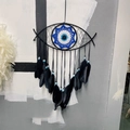 Acchiappasogni nero fatto a mano con design Evil Eye, perline e piume per decorazioni - Nero