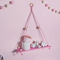 Pink bohemian woven wall hanging shelf with wooden beads for cozy home decor - Light Pink
