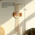 Detail of bohemian handmade cotton woven tapestry featuring a 90cm long tassel and bamboo ring - Caramel Beige Tapestry (132x20cm)