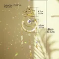 Close-up of golden lotus and moon suncatcher with crystal ball and hanging stones - Lotus Moon Style (ms378)