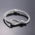 Braided grey and gold cord bracelet with silver U-shaped metal buckle and slide knots - Digital Camouflage