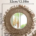 Dettaglio dello specchio da parete boho intrecciato a mano con frange di cotone - Grande (ms8334)