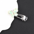 Detail of silver iridescent butterfly hair clip with crystal wings and metal duckbill grip - Green Butterfly