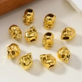 Set di dieci perle dorate a forma di teschio per gioielli fai-da-te e capelli - Oro KC