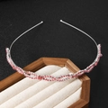 Elegante zilveren dunne hoofdband met glinsterende roze strassteentjes in golfdesign - Marquise Rozerood