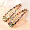 Set di due fermagli per capelli a goccia dorati con vivaci strass multicolore - Grande / Stile Lungo