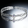 Detail of silver vine crown featuring a teardrop iridescent gemstone on mirror surface - Silver With AB Rhinestone