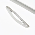 Minimalist silver zinc alloy hair clip with irregular textured finish on white background - Silver
