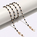 Elegant gold metal eyewear chain with black faceted beads and lobster clasps for glasses - Gold