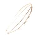 Detail of golden double-layer headband featuring sparkling rhinestones on a white surface - White Rhinestone Cross Rose Gold