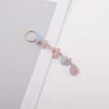Pendentif dreadlock fait main avec pierres naturelles roses et bleues et anneaux dorés - Bleu Rose
