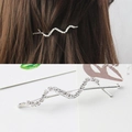 Fermaglio per capelli ondulato argento con strass scintillanti per uno stile elegante - Argento