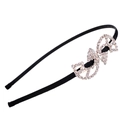 Detail view of a black fabric headband with a large sparkling rhinestone crystal bow - Gold Bow Style (I4501)