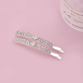Horquillas de pelo con pedrería de cristal plateado sobre fondo rosa suave - Plata Gruesa / Plateado