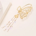 Pince à cheveux papillon dorée avec glands pendants, perles et breloques - Style Papillon Creux Gland avec Paillettes