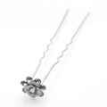 Detailed macro view of U-shaped hair pin with a grey resin rose and sparkling rhinestones - White (F5408)