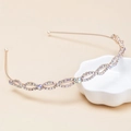 Cerchietto ondulato oro rosa con strass colorati scintillanti e motivo ovale vuoto - Strass AB Marquise (C8208) / Oro rosa