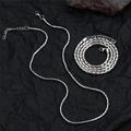 Collana minimalista in acciaio inossidabile argento con chiusura a moschettone su fondo scuro - 4.5mm / 60CM+5CM
