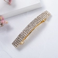 Detail of elegant gold spring hair clip with four rows of sparkling rhinestones - Gold 4-Row (B9229)