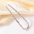 Detailed macro view of silver U-shaped hair pin with unique hammered metal texture and finish - Liquid Silver Small (D6329) / 10cm