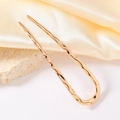 Detail of gold U-shaped metal hair pin with irregular hammered texture on silk fabric - Liquid Gold Small (D6329) / 10cm