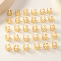 Nahaufnahme von 30 goldenen hohlen Haarringen für DIY Dreadlock Haar-Accessoires-Set - Gold