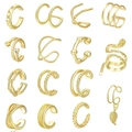 Detail of 15-piece gold ear cuff set showing various spiral and geometric textures - Gold Various Styles Collection