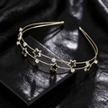 Double-layered golden metal headband with black stars and sparkling rhinestones - Gold Base Black Star (E5315)