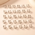 Lot de 30 anneaux de cheveux coeur évidé argentés pour accessoires de tresses tendance - 30 pièces / Argenté