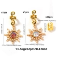 32-teiliges Set böhmischer Gold-Haarringe mit Sonnenblumen-Anhängern und Metall-Haarmanschetten - Gold