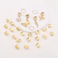 27-piece gold butterfly and leaf braid rings set with floral charms and pearls - Gold Style