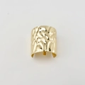 Minimalist gold metal hair hook with textured hammered finish in a modern open design - Gold